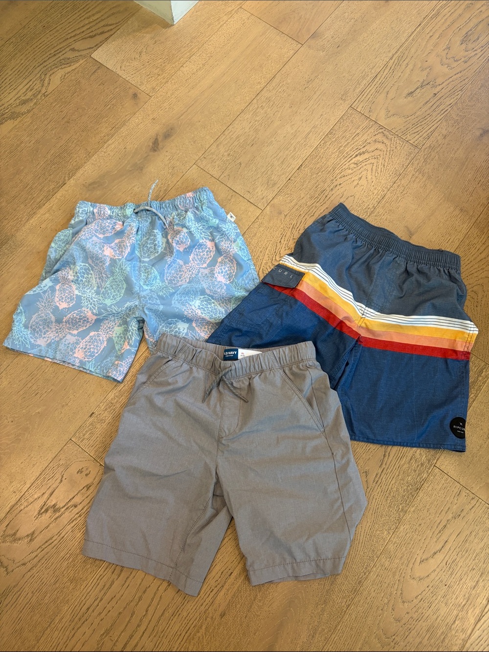 Boys Three-Pack Shorts - Blue Patterned, Navy Stripe (RipCurl) & Gray (Old Navy.